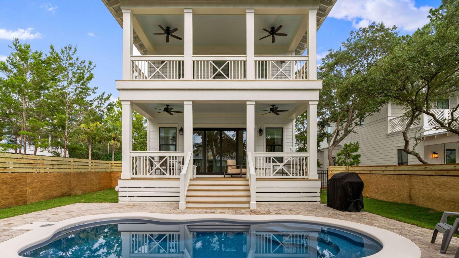 Two story home with balconies and private pool