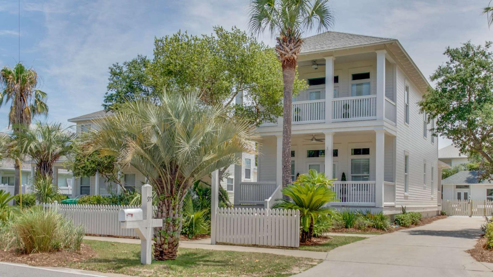 Exterior view of home with palms tree