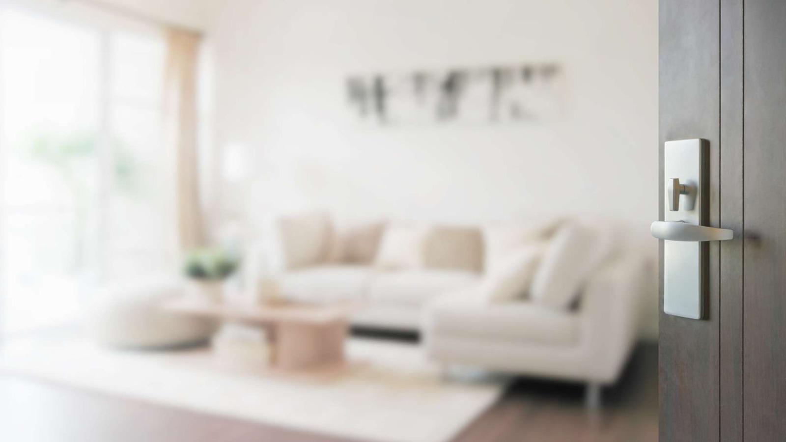 modern interior space with a focus on an open door