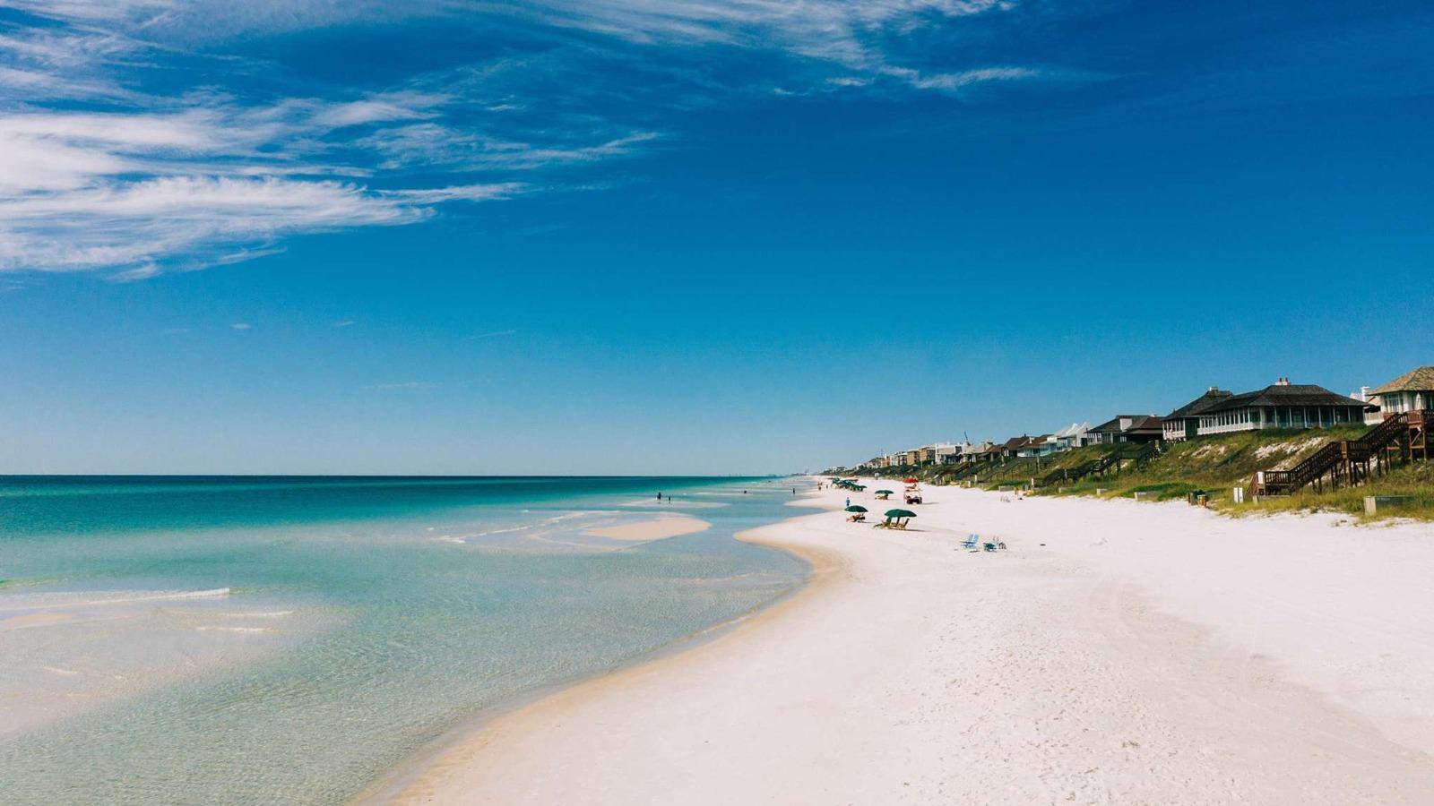 Beach landscape of houses and people on the beach